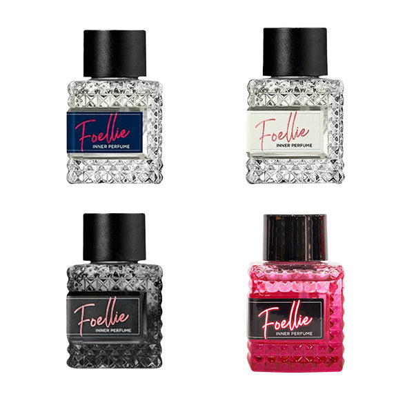 FOELLIE INNER PERFUME #EAU DE NOIR bottle, elegantly displayed beside its chic pink and black packaging. Buy at MyAllures for a touch of sophistication.