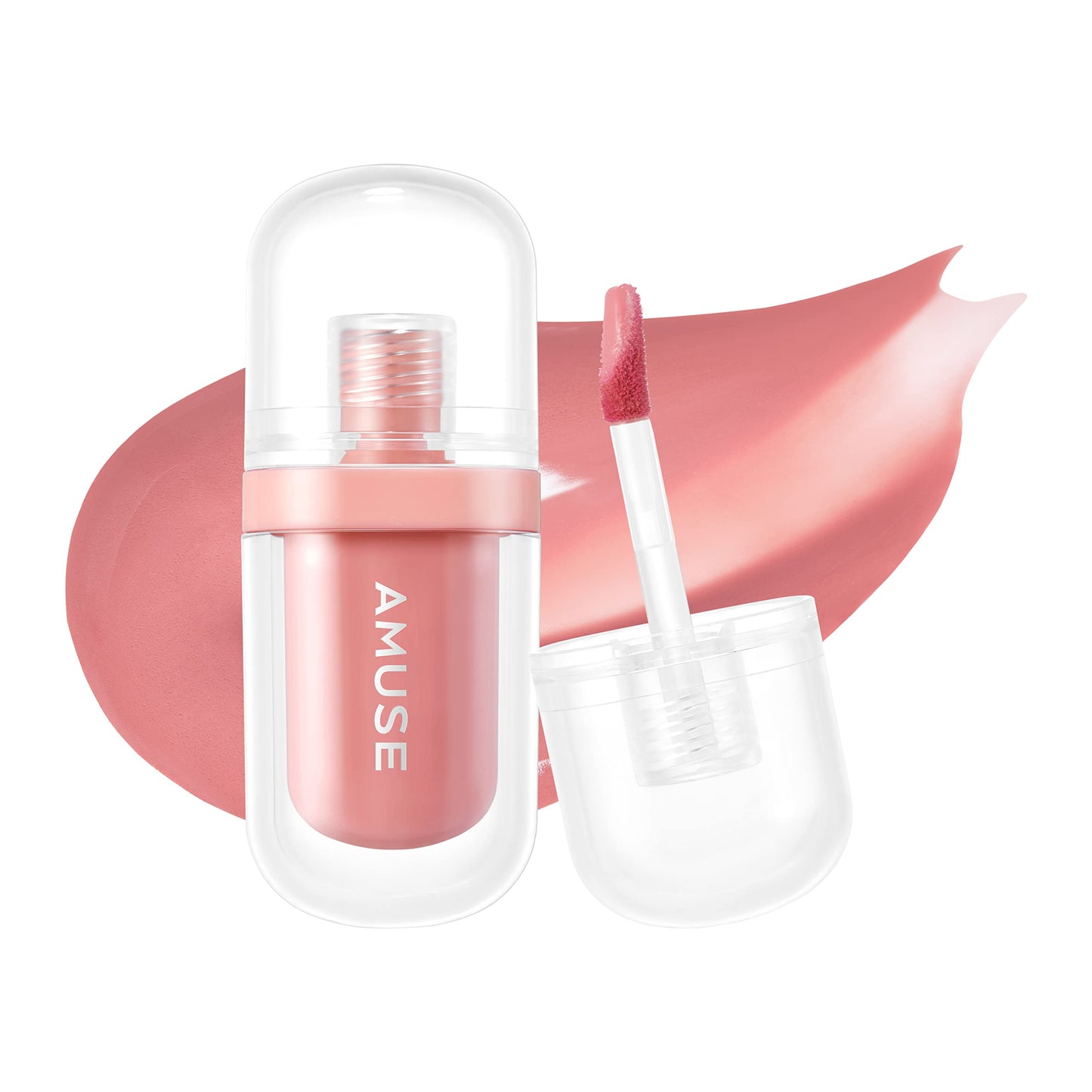 A bottle of AMUSE JEL-FIT TINT in pink, featuring a doe-foot applicator, sits open against a backdrop of a pink gloss smear. The word "AMUSE" is elegantly printed on the bottle. Purchase it at MyAllures for an effortless, glossy finish!