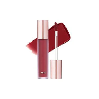 An image shows a tube of BBIA LAST VELVET TINE liquid lipstick with its wand applicator. The color swatch is displayed, and a close-up of lips wearing the lipstick in shade #V24 Trendy Note is seen. Available to buy at MyAllures.