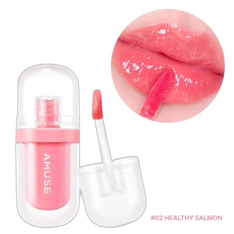 A container of AMUSE JEL-FIT TINT with a wand applicator is shown. A close-up of lips wearing the gloss in shade "#07 CARAMEL" is depicted above the container. You can buy it at MyAllures for that perfect caramel shine.