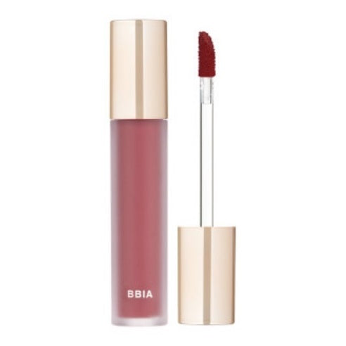 BBIA's LAST VELVET TINE matte liquid lipstick, featuring a gold cap, is shown alongside two photos of lips adorned with the same shade. The shade is labeled "#14 Chill Boss," and the BBIA brand name is displayed on the tube. Available for purchase at MyAllures.