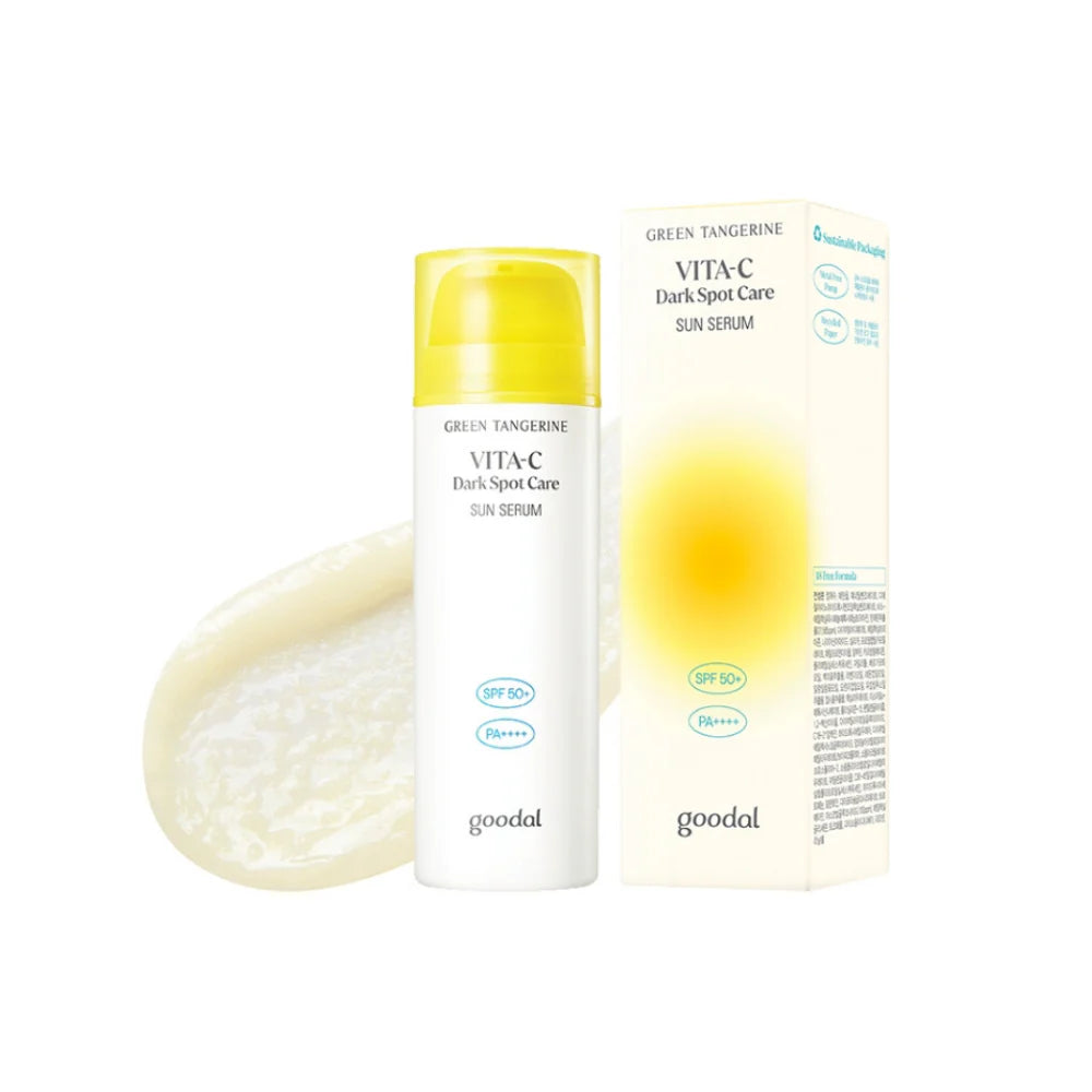 A white bottle of GOODAL Green Tangerine Vita C Dark Spot Care Sun Serum with a yellow cap, available to buy at MyAllures. The product label boasts SPF 50+ and PA++++ for superior sun protection.