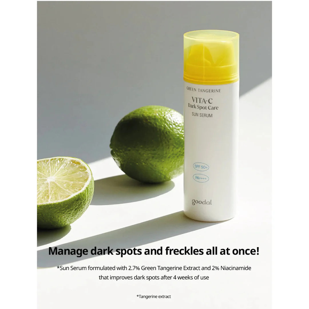 A hand dispensing a yellow-topped serum labeled "GOODAL GREEN TANGERINE VITA C DARK SPOT CARE SUN SERUM" onto the back of another hand. Text above reads "Popping capsules on moist serum." Available to buy at MyAllures.