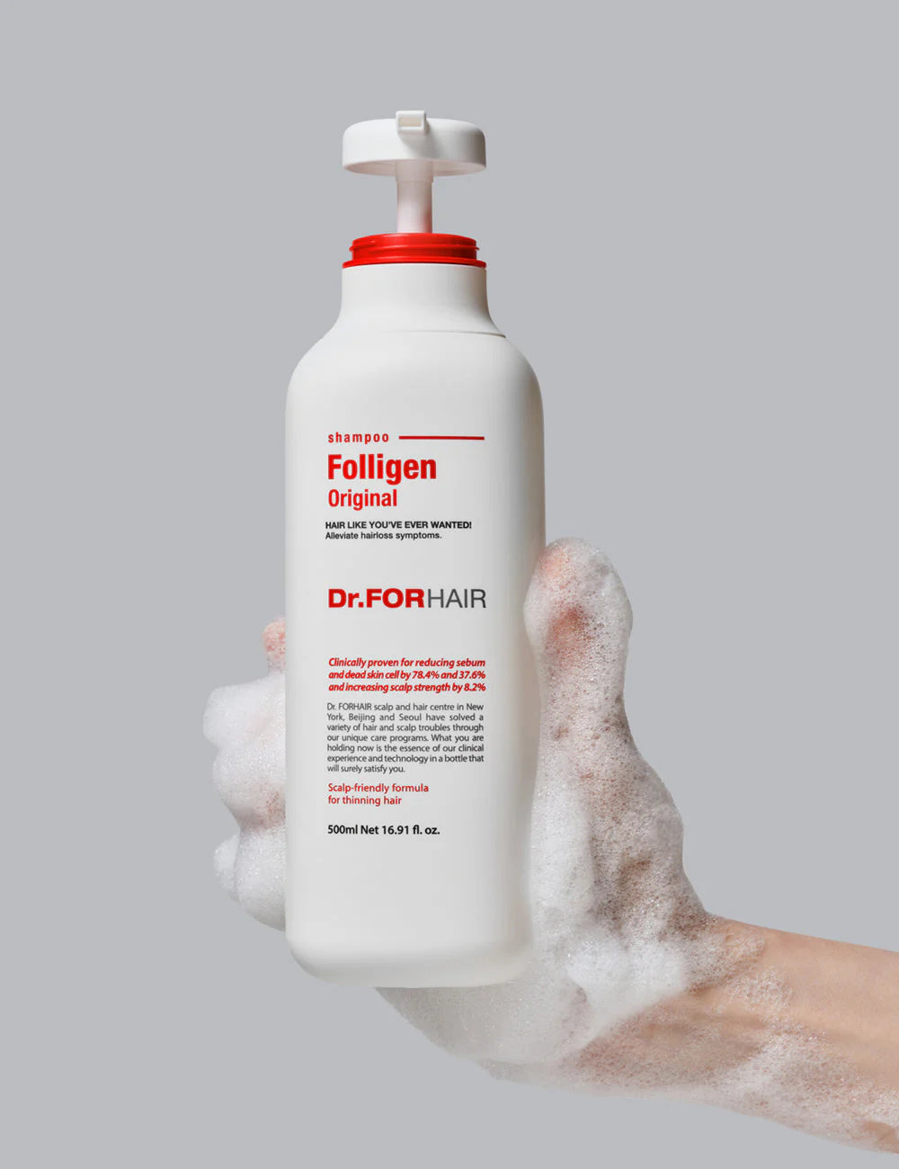 Image of a DR.FOR HAIR FOLLIGEN ORIGINAL SHAMPOO bottle from Dr.For Hair, featuring key ingredients highlighted around it. Labels emphasize benefits such as hair-loss relief, scalp strengthening, follicle nutrition, improved scalp elasticity, and softer hair. Available for purchase at MyAllures.