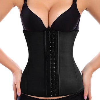 A person wearing a beige LATEX CORSET with hook-and-eye closures over a black outfit. The corset, available to buy at MyAllures under the brand name LATEX, is cinched tightly around the waist.