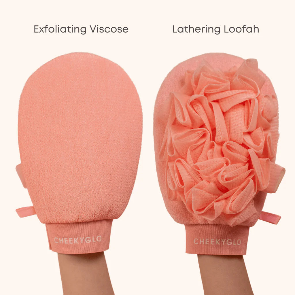 A hand holding a pink exfoliating loofah glove with a handle labeled "CHEEKYGLO," available to buy at MyAllures.