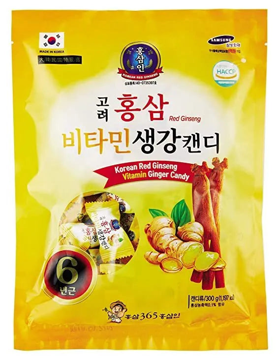 A plate with three unwrapped yellow KOREAN RED GINSENG VITAMIN GINGER CANDY 300G and three wrapped candies in yellow packaging featuring ginger images, available to buy at MyAllures.