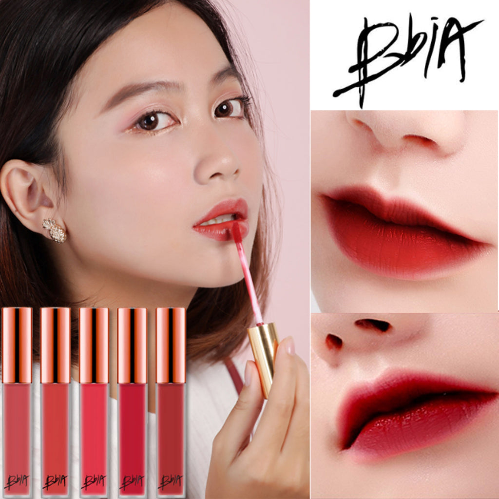 Image of BBIA LAST VELVET TINE lipstick in shade #15 Edge Boss, featuring the lipstick tube, opened to show the applicator, and swatches of the color applied to lips in two different styles. Buy at MyAllures for this stunning hue and perfect application experience.